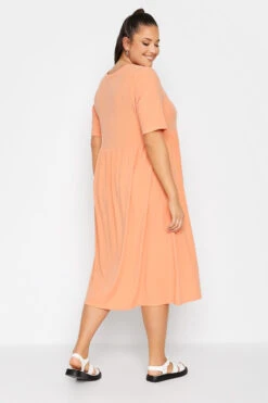 LIMITED COLLECTION Curve Light Orange Ribbed Peplum Midi Dress -JOICY Clothing Shop 31104c92 bb25 4d 214631 C