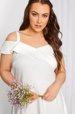 YOURS LONDON Curve White Bardot High Low Bridal Midi Dress 8 YOURS LONDON Curve White Bardot High Low Bridal Midi Dress -JOICY Clothing Shop 444f87a7 913d 4b 162089 D