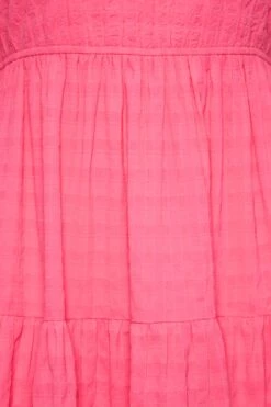 LIMITED COLLECTION Curve Hot Pink Textured Tiered Smock Dress -JOICY Clothing Shop b9870bbd e935 42 215542 Z