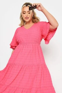 LIMITED COLLECTION Curve Hot Pink Textured Tiered Smock Dress -JOICY Clothing Shop e70eb3a0 331a 4d 215542 D